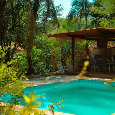 pexels photo 10672001 10672001 Lush tropical setting with pool and gazebo, perfect for relaxation in Brazil's natural beauty.
